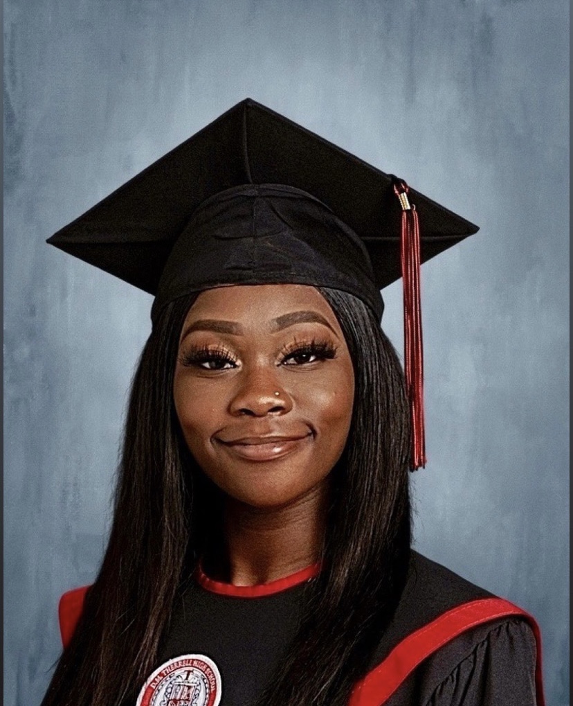 Brianna Sellers, LIE Foundation Secretary, in graduation attire